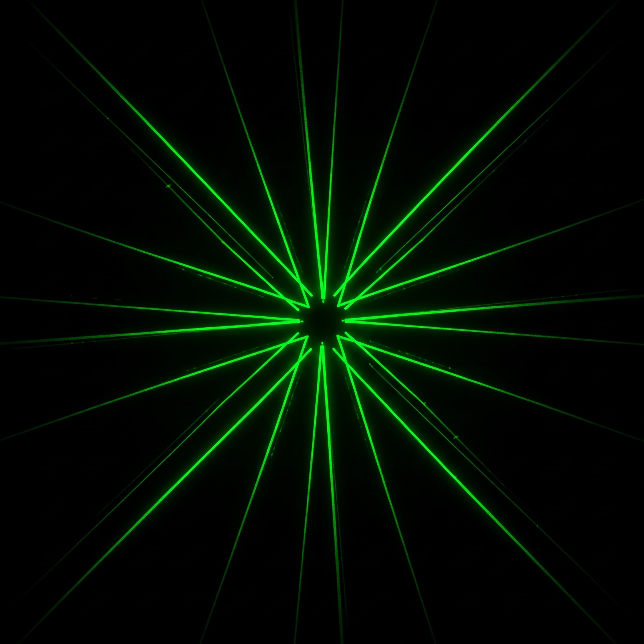 photo of Green Laser Light Burst on Black